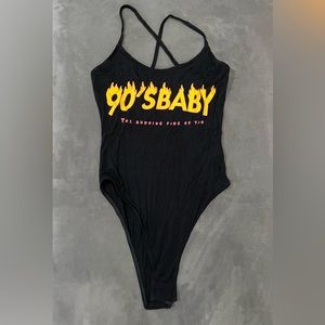 “90s baby” graphic bodysuit. Crossed strap detail. Size s.